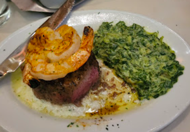 Ruth's Chris Steak House (Harrah's Cherokee) signature dishes Beef Carpaccio
Petite Filet & Shrimp
Tomahawk Ribeye